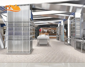 Futuristic optical showroom with metal display fixtures, central display table, and vertical feature wall