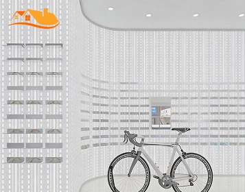 Bicycle display beside vertical shelving in a bright perforated-wall showroom