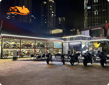 Shipping Container Motorcycle Showroom Night View